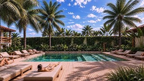 A pool area with lounge chairs, palm trees, and a stone wall. - Margaridas Boutique Hotel - antiga Pousada Jardim das Margaridas (Porto Seguro)