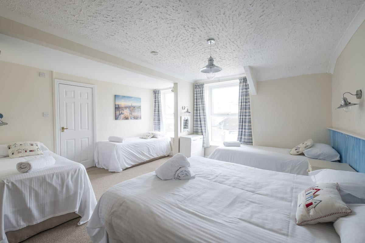 Family Room, Partial Sea View (Room 8) | Free WiFi, bed sheets