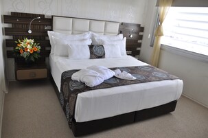 Ropa de cama de alta calidad y minibar 