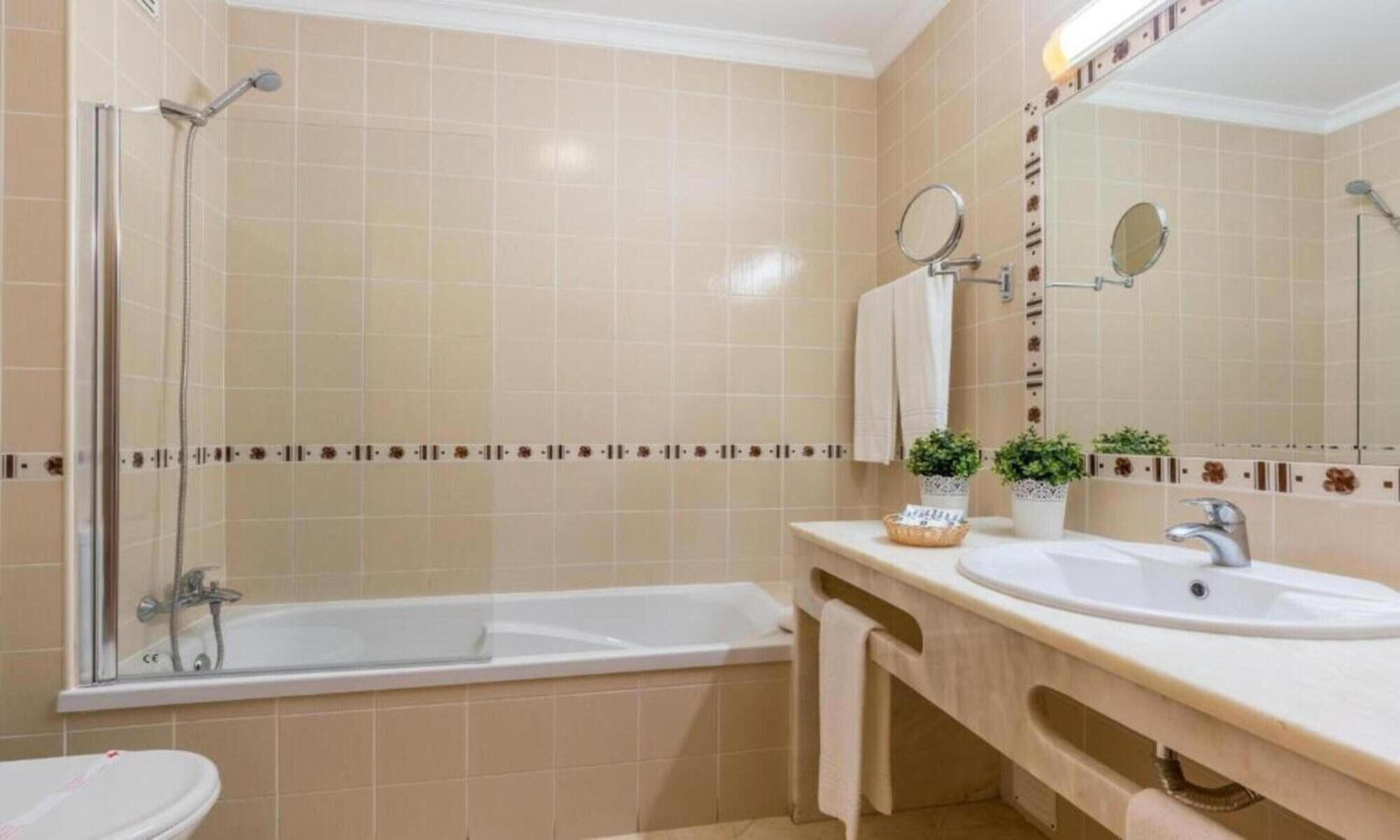 Hair dryer, towels, soap, shampoo