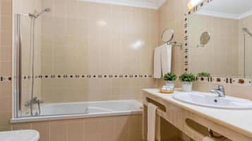 Hair dryer, towels, soap, shampoo