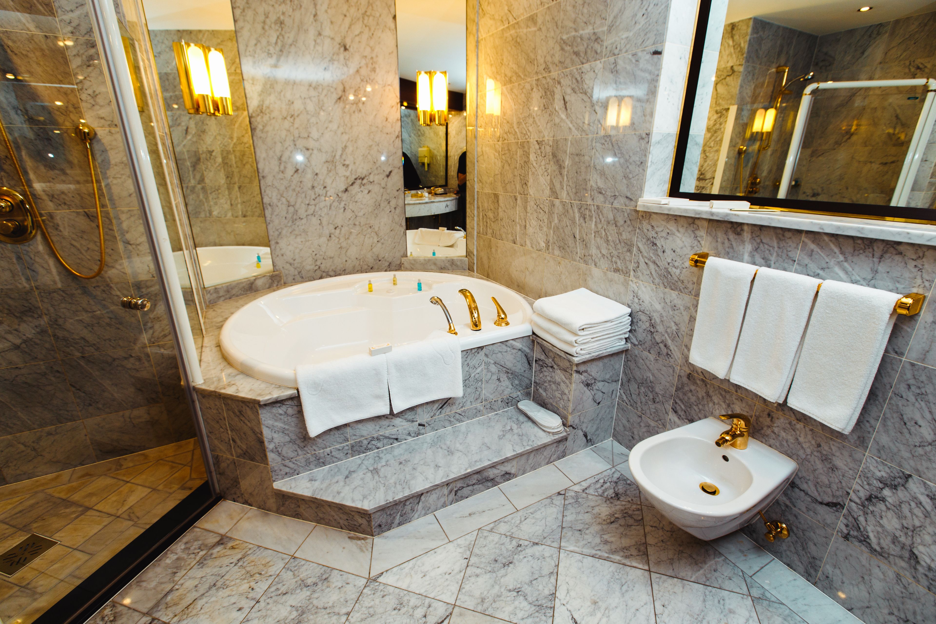 presidential suite | bathroom | bathtub, free toiletries, hair dryer, bathrobes