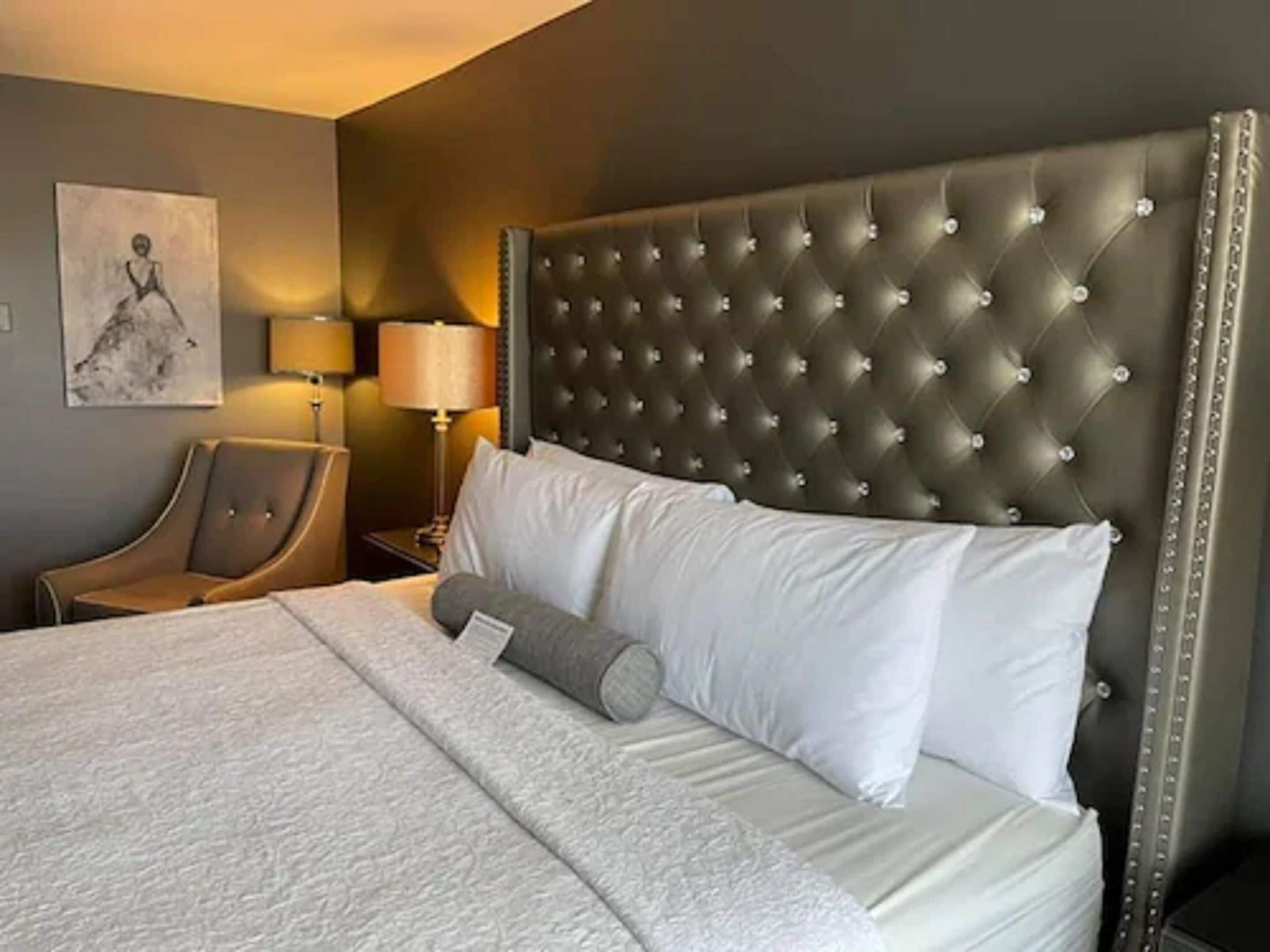 premium bedding, desk, laptop workspace, blackout curtains