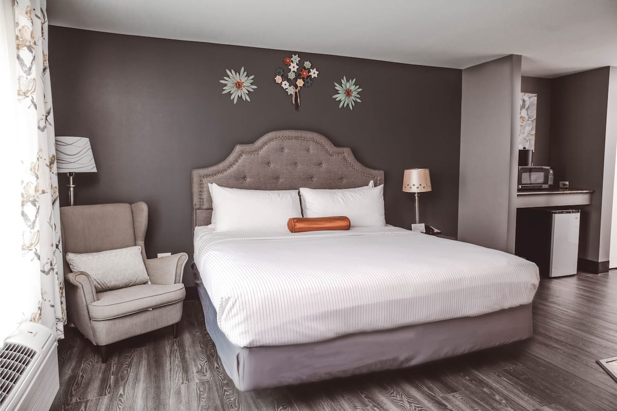Premium bedding, desk, laptop workspace, blackout curtains