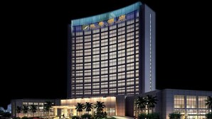 A high-rise hotel with a modern design, featuring a prominent glass facade and a flat roof. - Triumphal View Hotel (Dongguan)