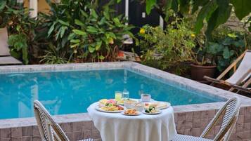 Outdoor pool, sun loungers