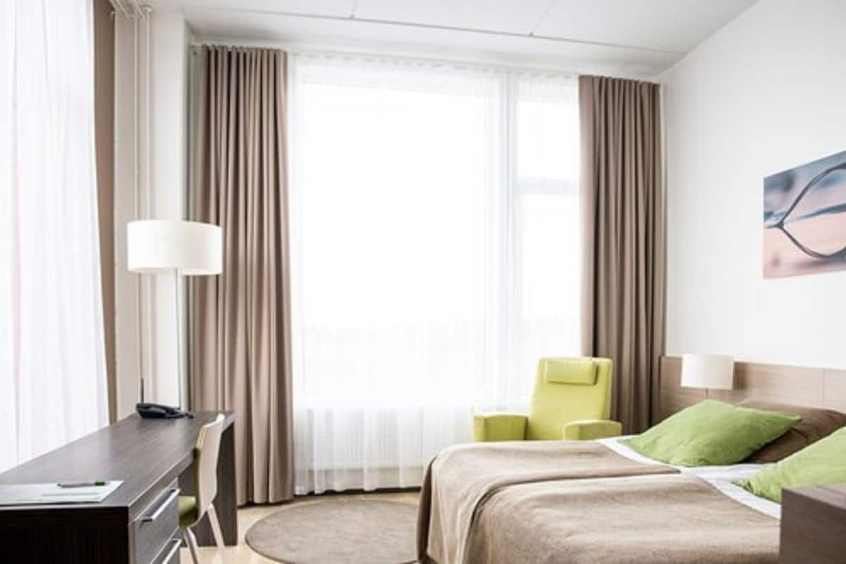 superior room | desk, laptop workspace, blackout curtains, soundproofing