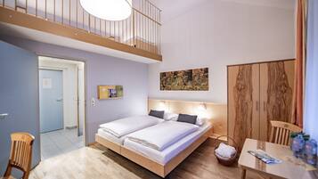 Maisonette | Ropa de cama hipoalergénica y caja de seguridad en la habitación