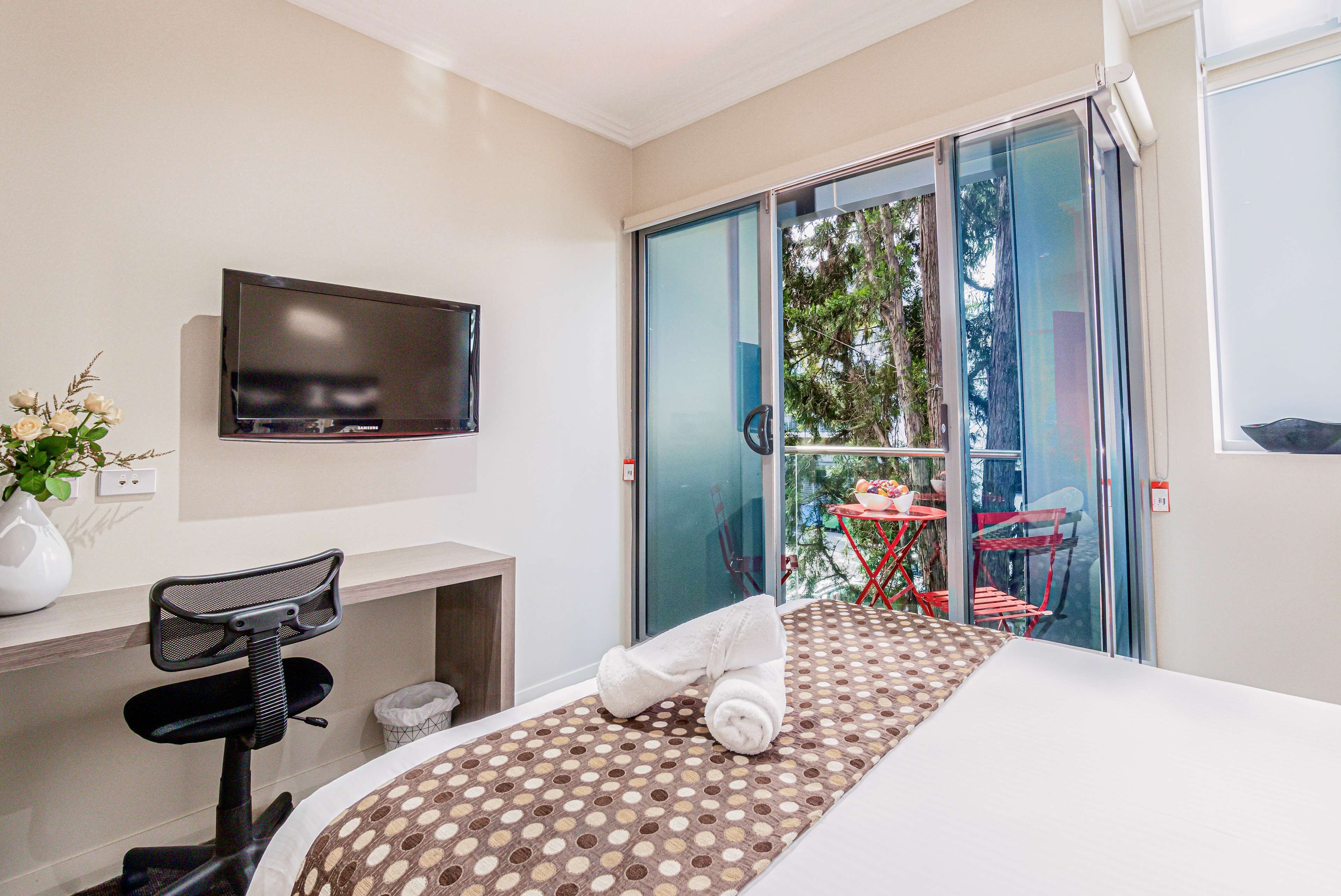 Deluxe Room, 1 Double Bed, Non Smoking, Balcony (Small Room) | In-room safe, desk, laptop workspace, iron/ironing board