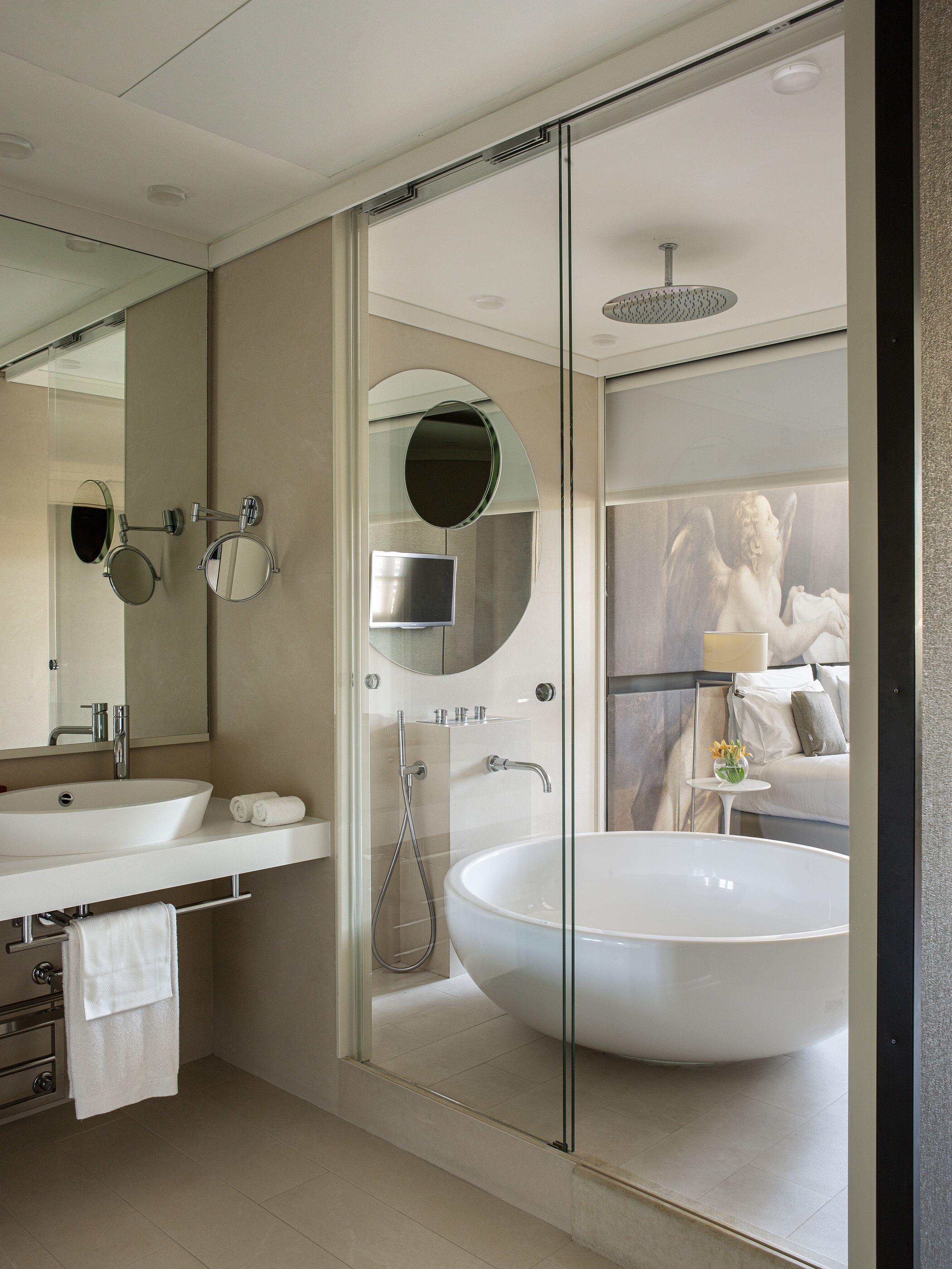 Rainfall showerhead, designer toiletries, hair dryer, bathrobes