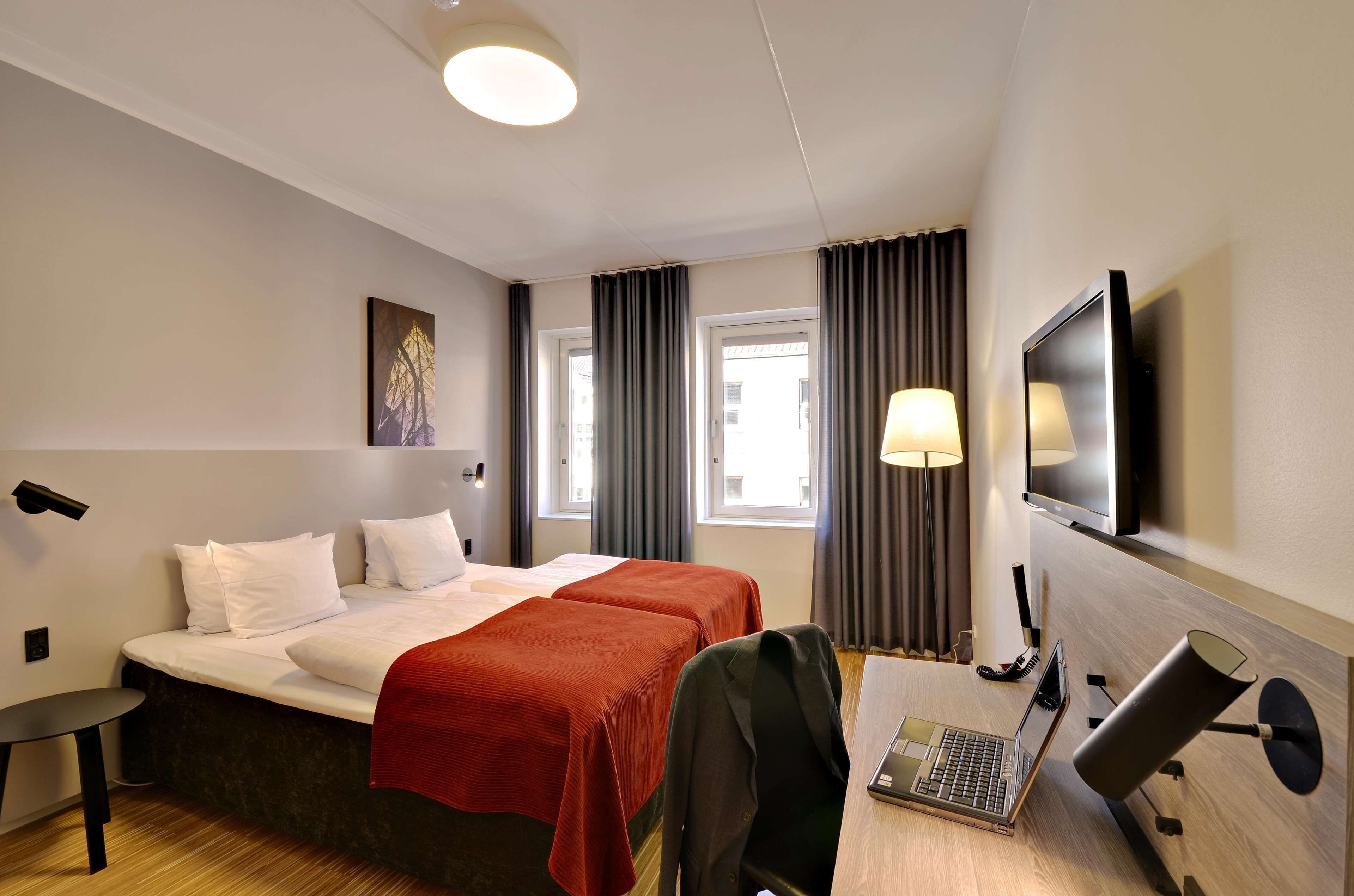 standard double or twin room | in-room safe, blackout curtains, iron/ironing board, bed sheets