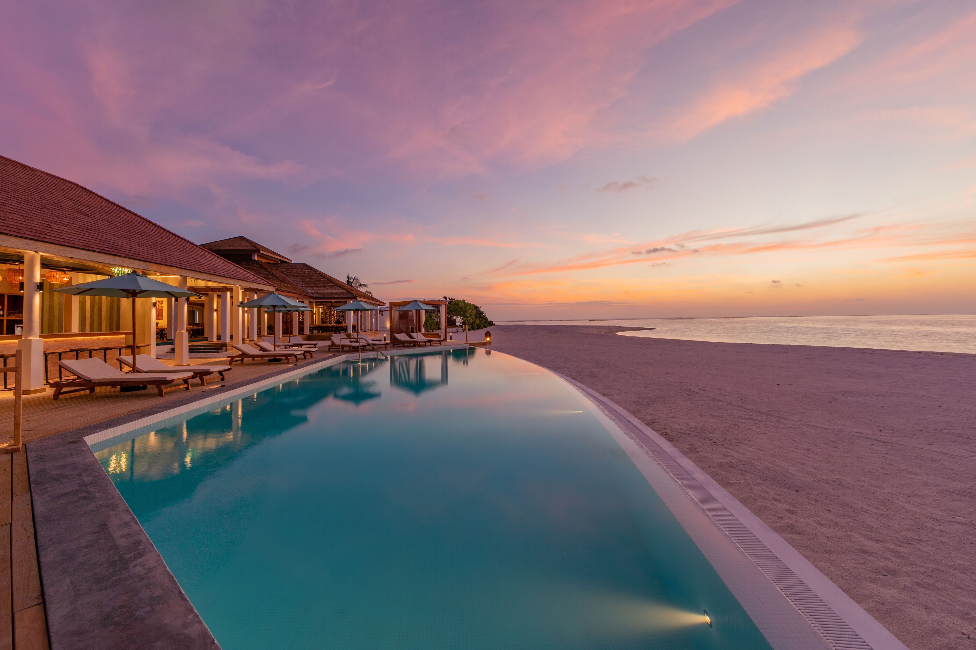 Outdoor pool, free cabanas, pool umbrellas