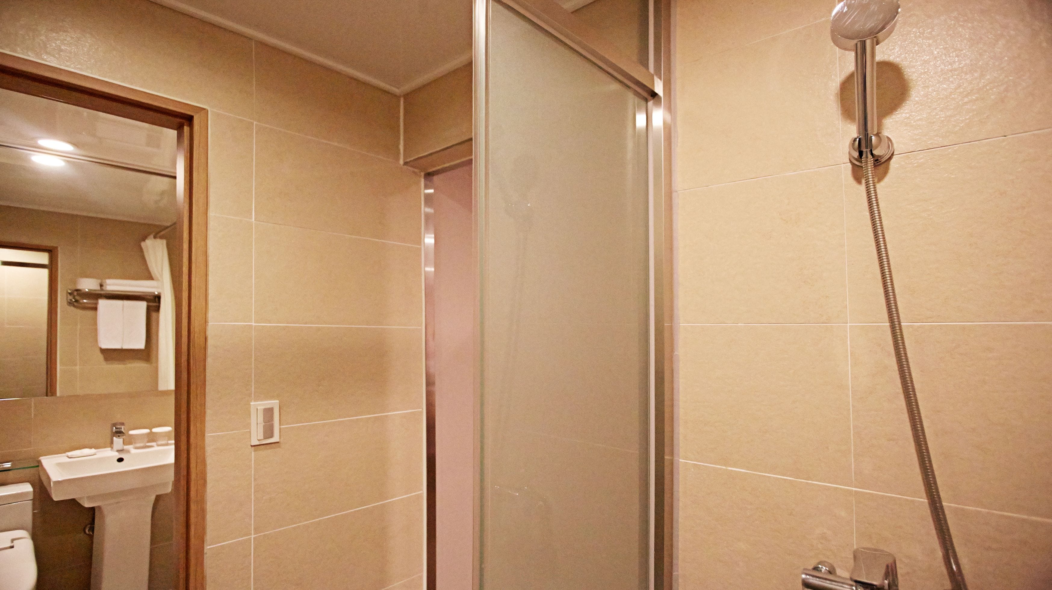 shower, hair dryer, bathrobes, slippers