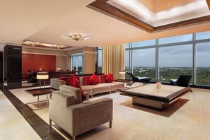 Presidential Suite, 2 Bedrooms | Living room | 42-inch LCD TV with digital channels, TV, fireplace - Le Meridien Coimbatore (Coimbatore)