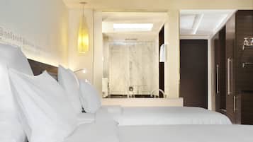 Premium bedding, memory-foam beds, in-room safe, desk