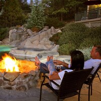 Seasonal outdoor pool, open 8:00 AM to 10:00 PM, pool umbrellas