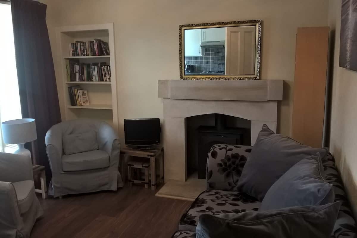 Family Apartment, Ground Floor | Living room | Flat-screen TV, DVD player