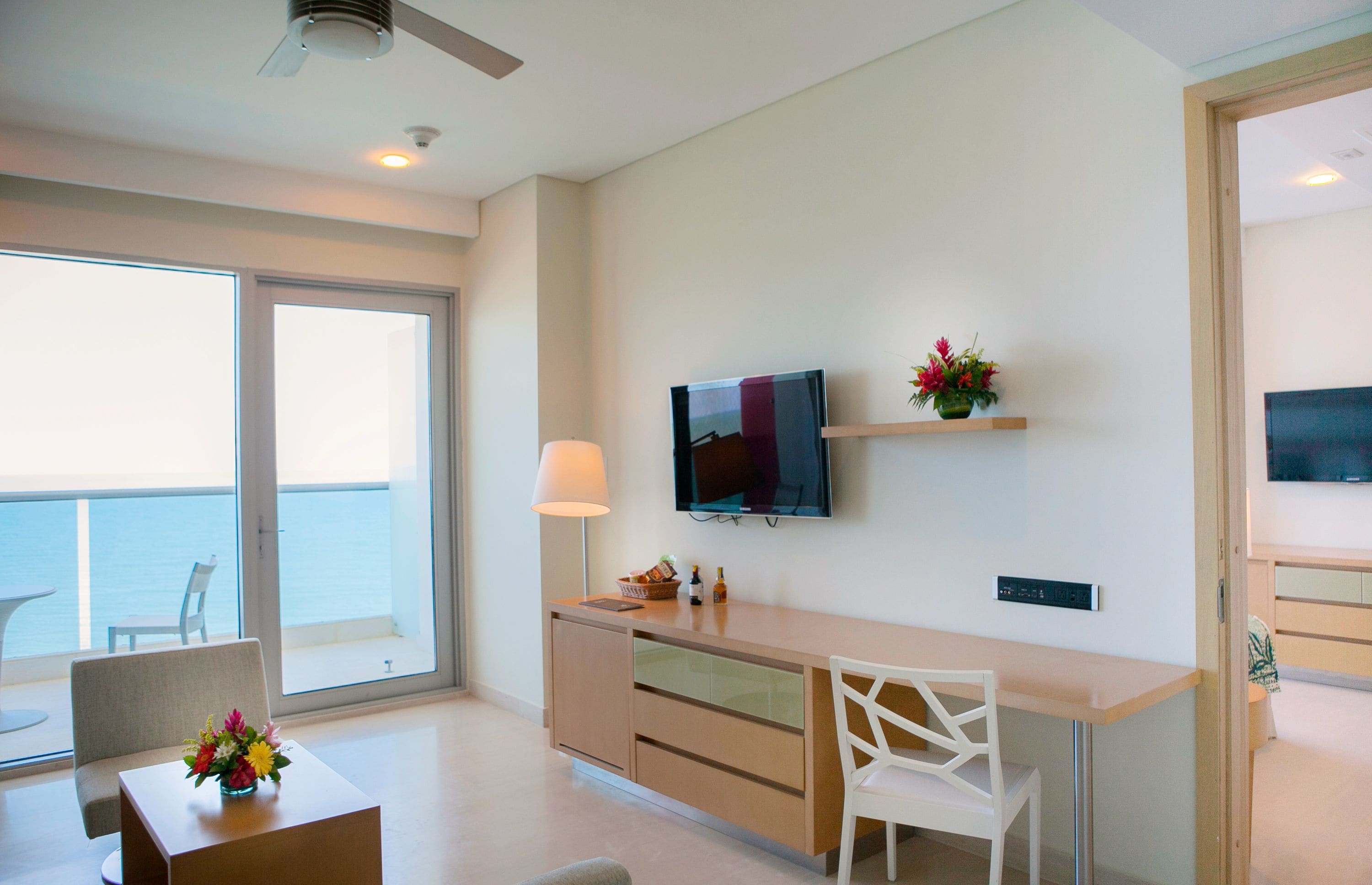 junior suite, 1 king bed, sea view | 1 bedroom, premium bedding, minibar, in-room safe