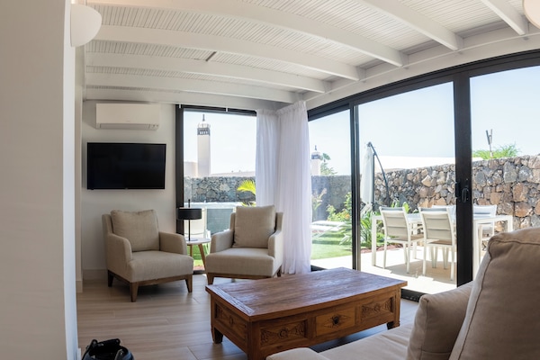 Cottage, 2 Bedrooms | Living area | 43-inch flat-screen TV with cable channels, TV