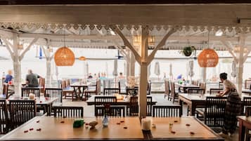 Breakfast, lunch, dinner served; beach views