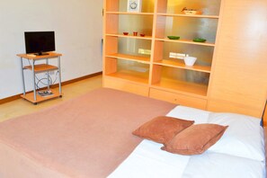 Apartamento (2 Adults) | Roupas de cama premium, camas Select Comfort, frigobar