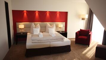 Literie hypoallergénique, coffres-forts dans les chambres, bureau