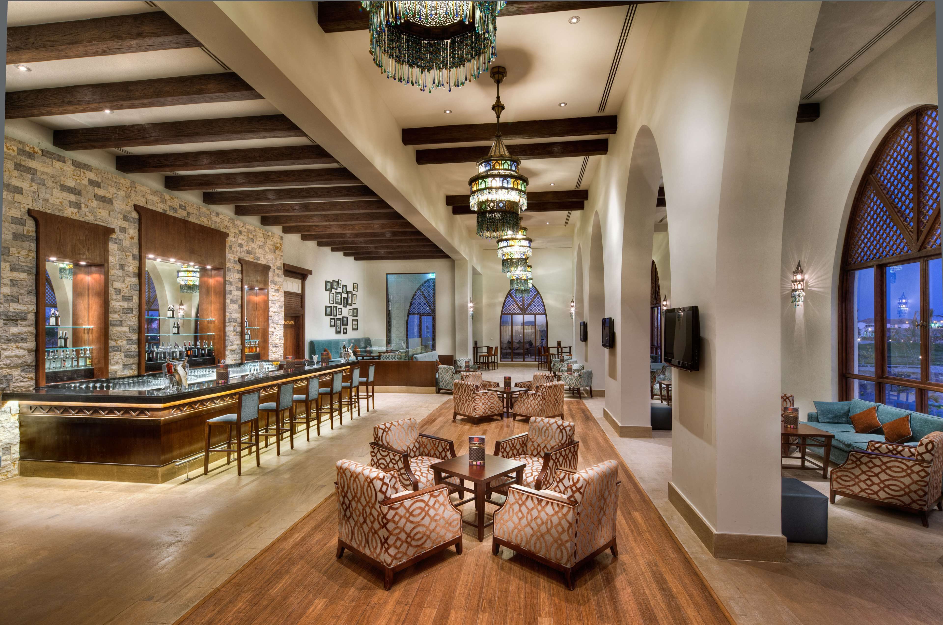 7 bars/lounges, 3 poolside bars, beach bar