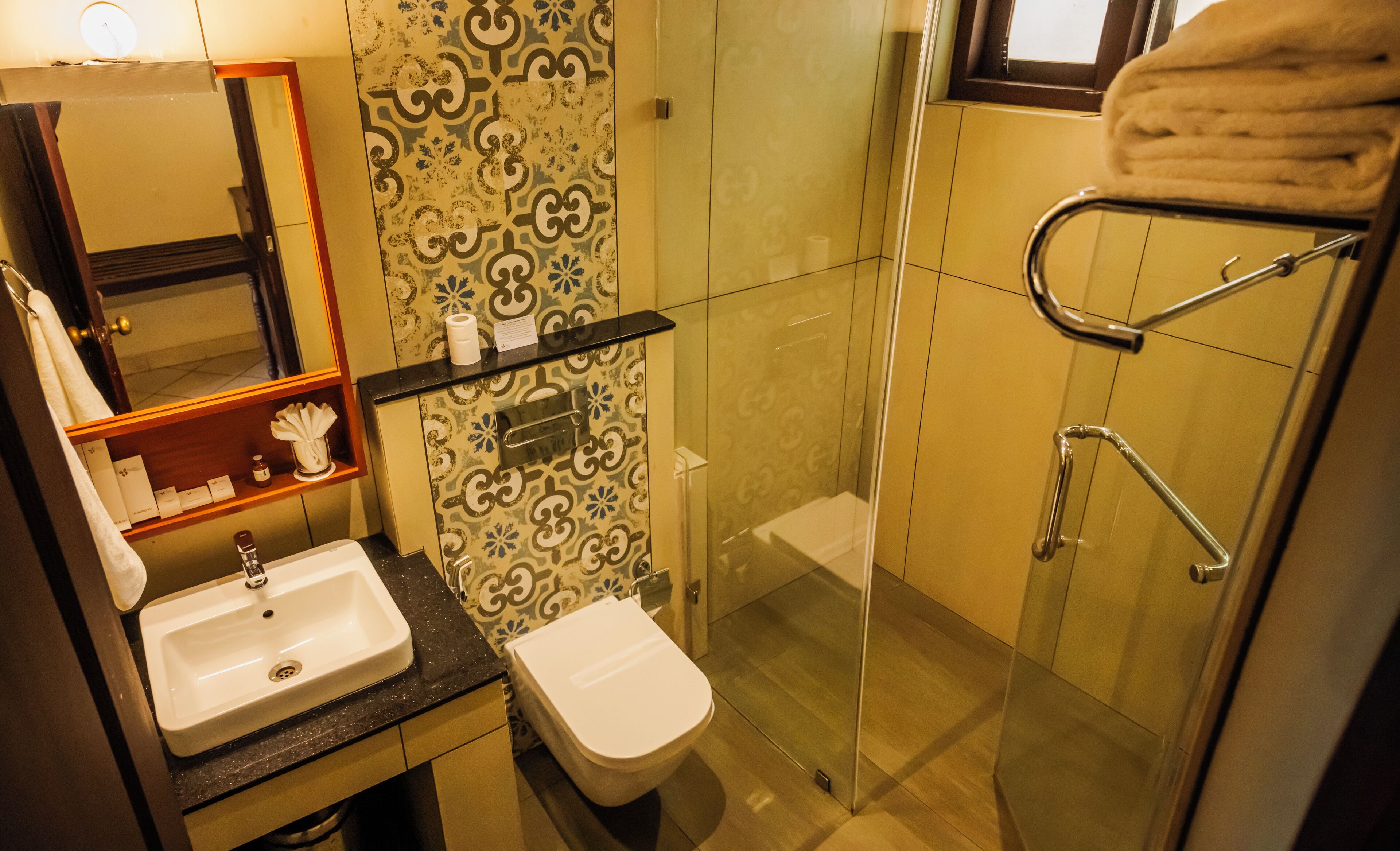 lake view room | bathroom | shower, rainfall showerhead, free toiletries, hair dryer