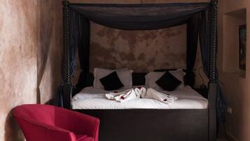 Deluxe Suite, Private Bathroom | Premium bedding, in-room safe, individually decorated