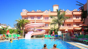 Seasonal outdoor pool, pool umbrellas, pool loungers