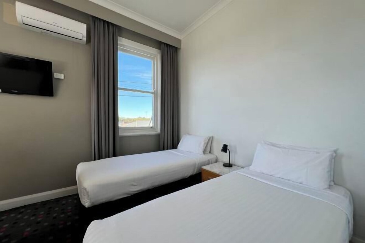Desk, blackout drapes, iron/ironing board (on request), WiFi (free)