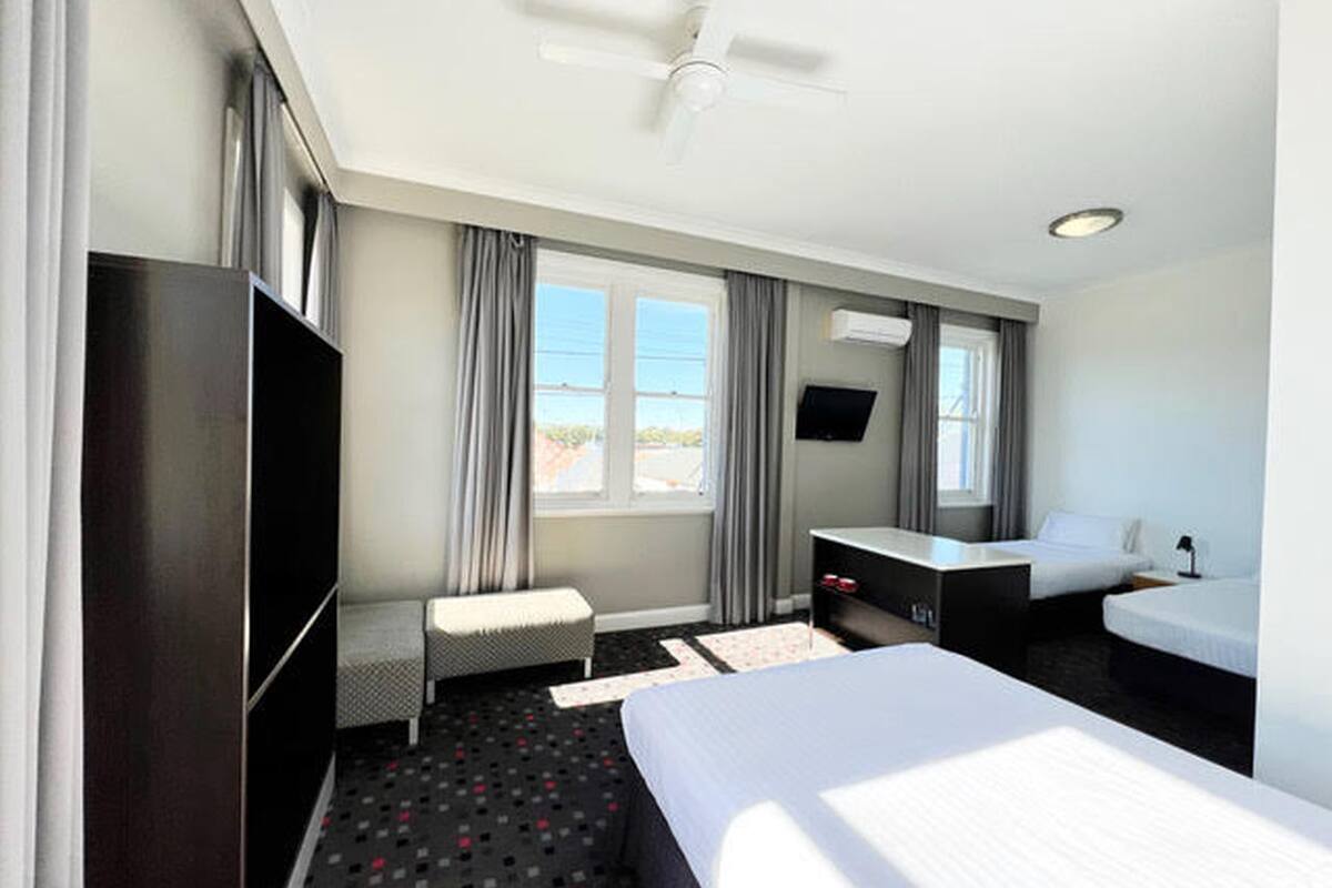 the sunnyside suite, ensuite | 1 bedroom, individually furnished, desk, blackout curtains