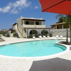 Outdoor pool, pool umbrellas, pool loungers
