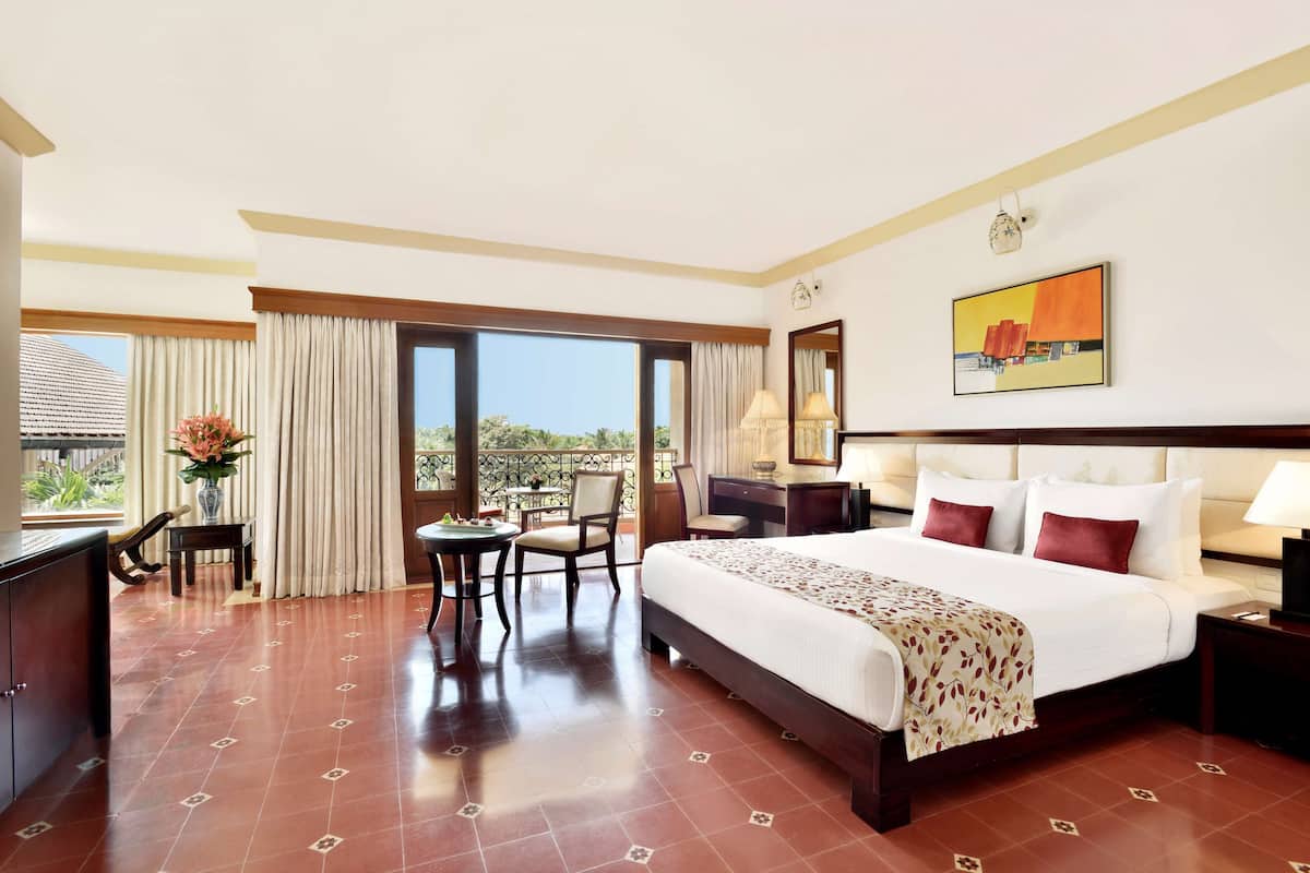 luxury suite with living room and balcony ( partial garden view ) | 1 bedroom, minibar, in-room safe, desk