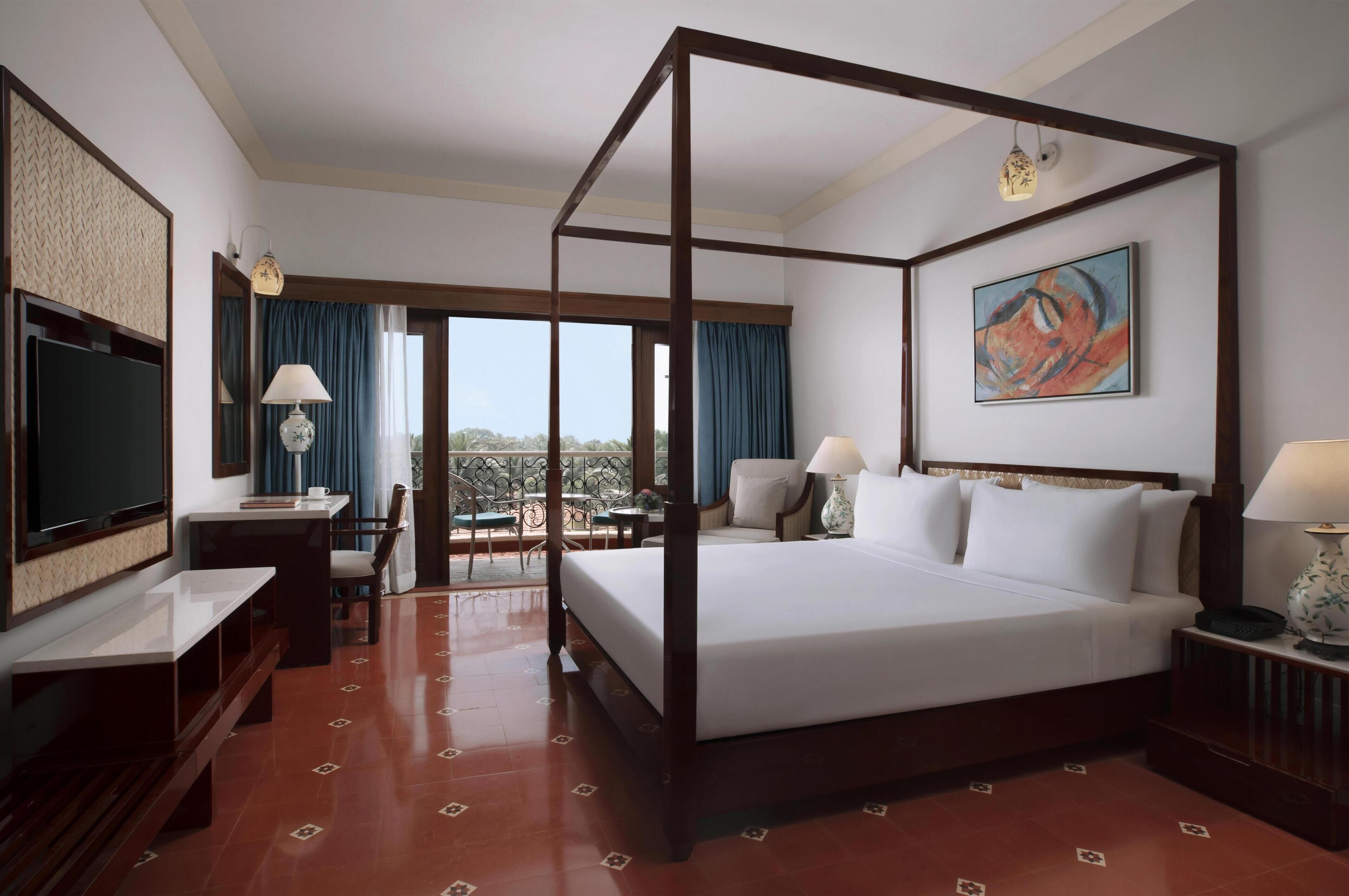 Superior Room with Balcony ( Partial Garden View ) | Minibar, in-room safe, desk, laptop workspace