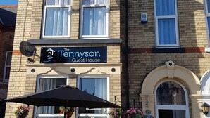 A two-story building with a sign reading "The Tennyson Guest House." - The Tennyson (Bridlington)