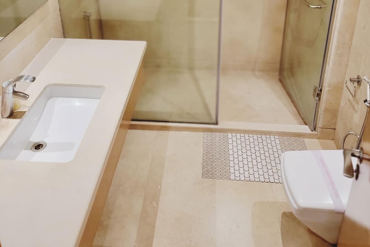 Shower, designer toiletries, hair dryer, bathrobes