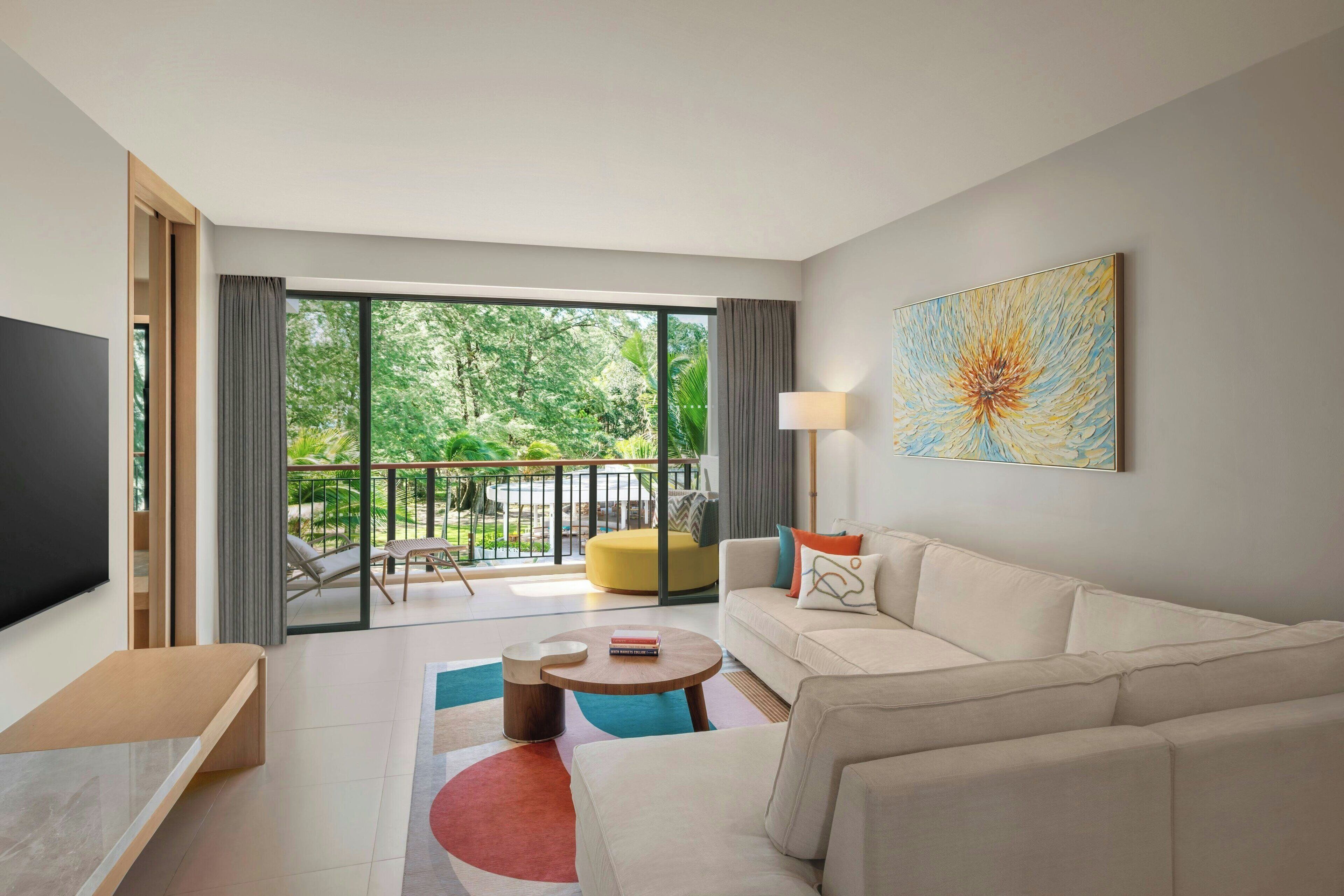 Suite, 2 Bedrooms, Ocean View | Living room | 50-inch LED TV with digital channels, toys, books