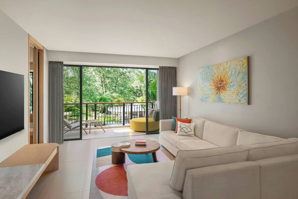 Suite, 2 Bedrooms, Ocean View | Living room | 50-inch LED TV with digital channels, toys, books