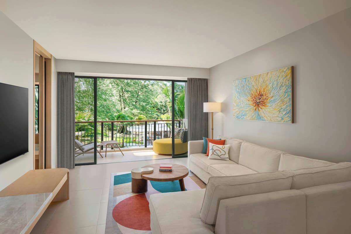 Suite, 2 Bedrooms, Non Smoking, Ocean View | Living room | 50-inch LED TV with digital channels, toys, books