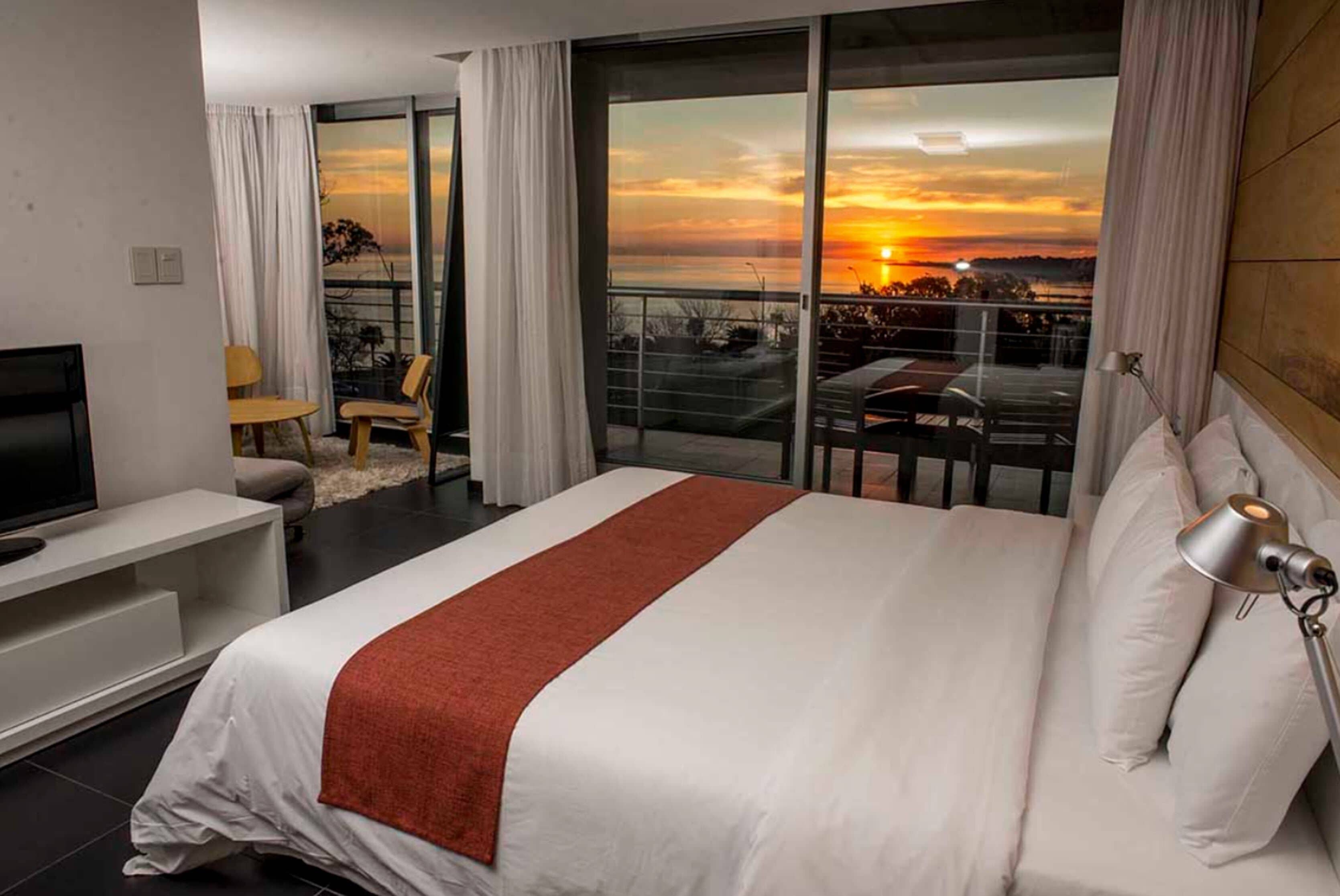 suite, river view | minibar, in-room safe, desk, blackout curtains