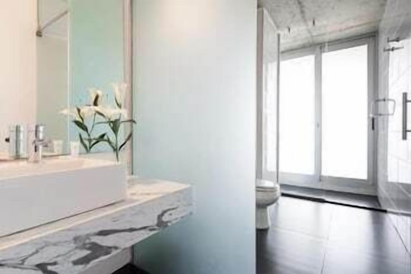 Bathroom | Shower, rainfall showerhead, designer toiletries, hair dryer