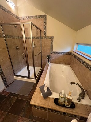 Separate tub and shower, deep soaking tub, free toiletries, hair dryer
