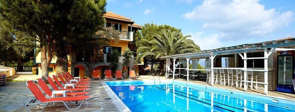 Outdoor pool, pool umbrellas, pool loungers