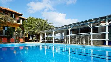 Outdoor pool, pool umbrellas, pool loungers