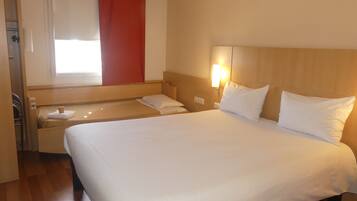 Standard Room, Multiple Beds | In-room safe, desk, soundproofing, iron/ironing board (on request)
