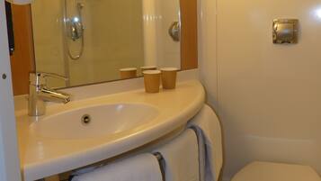 Eco-friendly toiletries, hair dryer, towels