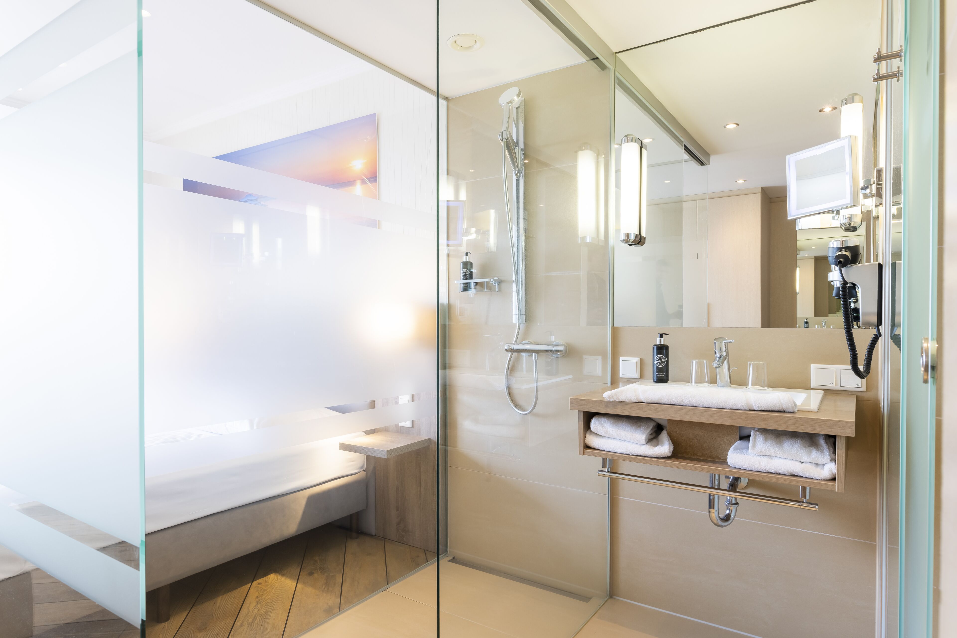 shower, rainfall showerhead, hair dryer, towels