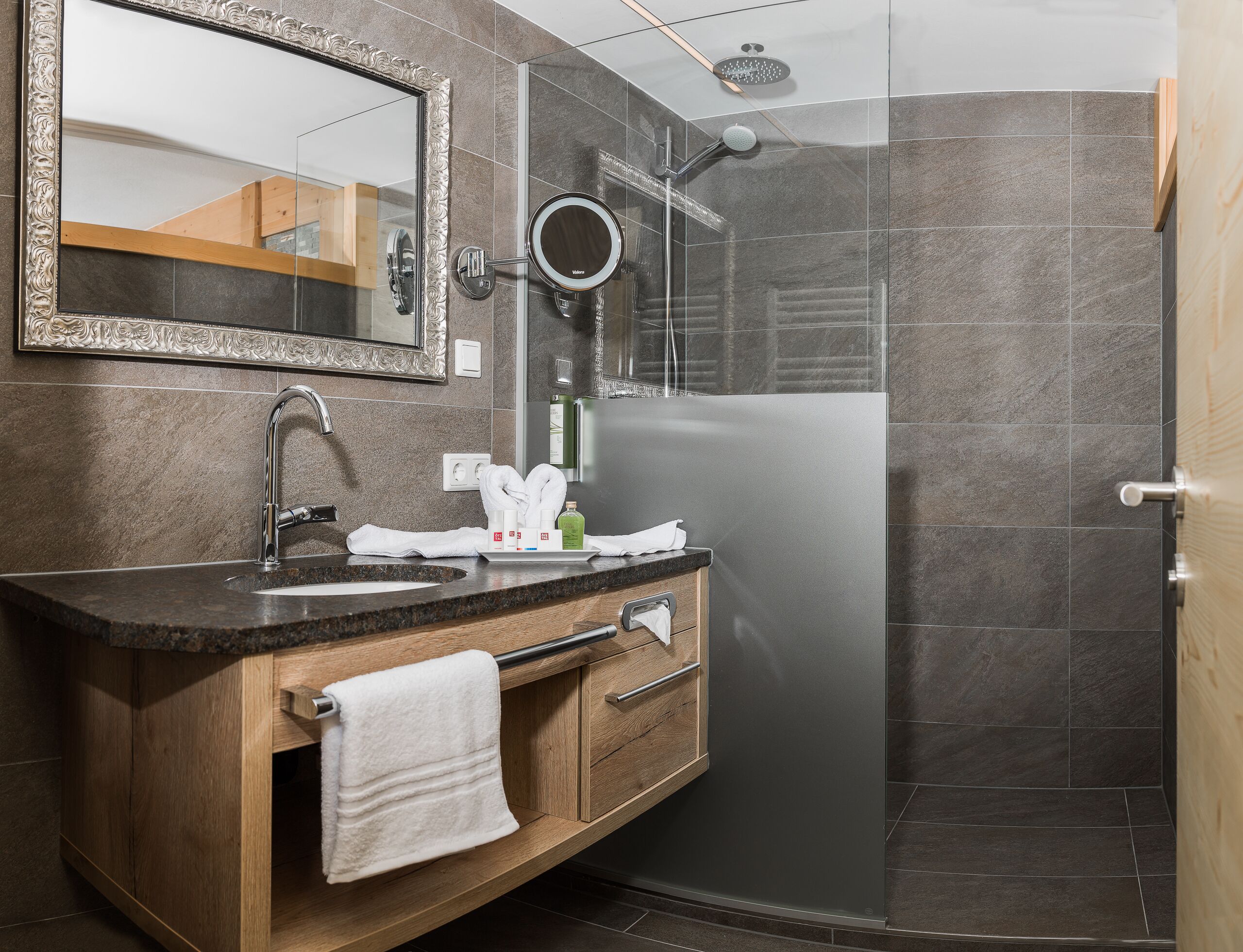 superior double room, balcony, valley view | bathroom | deep-soaking bathtub, rainfall showerhead, designer toiletries