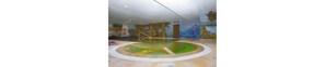 An indoor swimming pool with a mural on the wall depicting a natural landscape. - La Madonnina (Budduso)